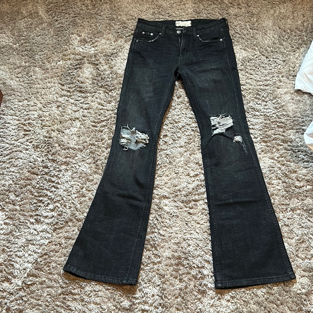 Never worn, never washed size 26 free people flare / boot cut jeans